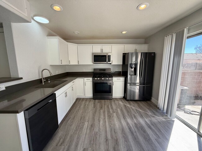 Building Photo - $300 OFF 1ST MONTHS RENT Updated 3-Bedroom Townhome in Gated Community with Pool Access