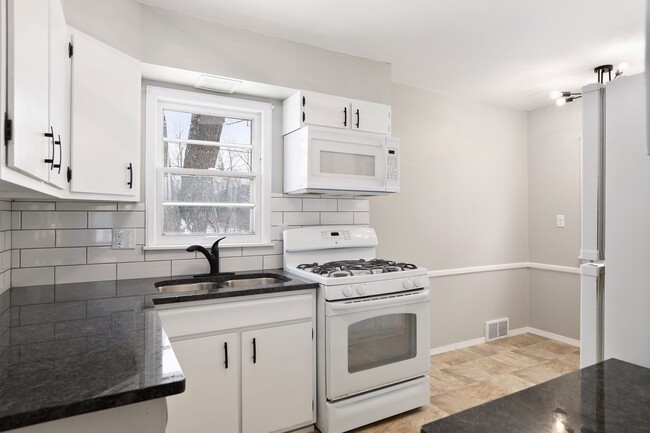 Updated kitchen and appliances - 1395 Taylor Ave W