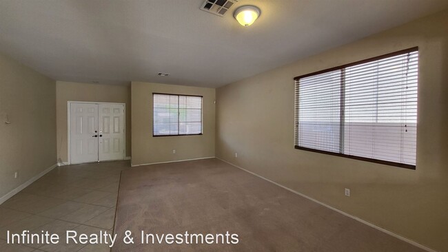 Building Photo - 4 br, 3 bath House - 6534 American Beauty ...
