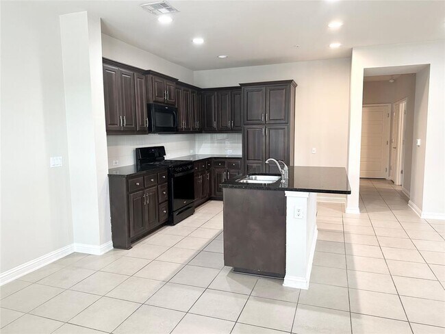 Foto del edificio - 6814 E Riverside Dr