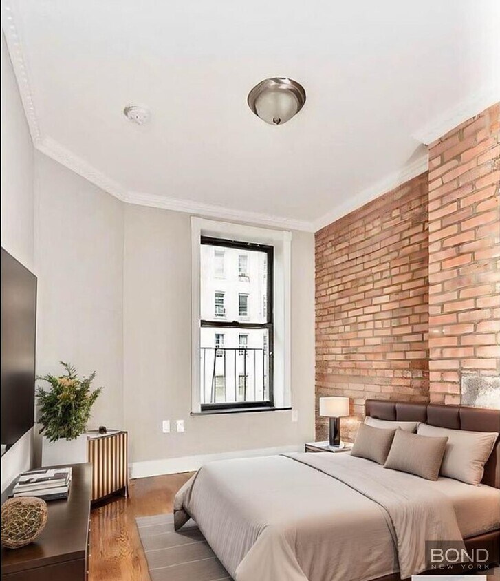 Foto del edificio - 422 E 9th St