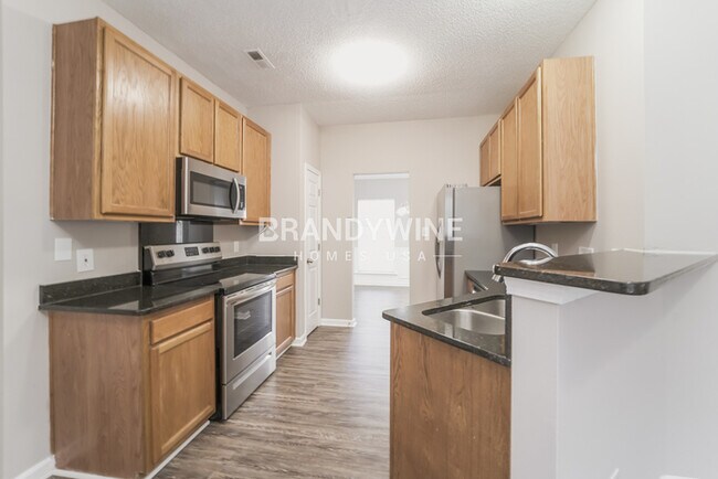 Building Photo - NEW Lower Rental Rate Leasing Special: Mar...