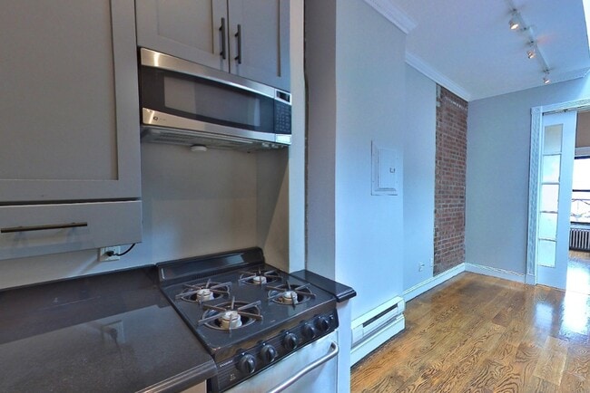 Building Photo - 697 Tenth Ave (47th & 48th St), #5FN