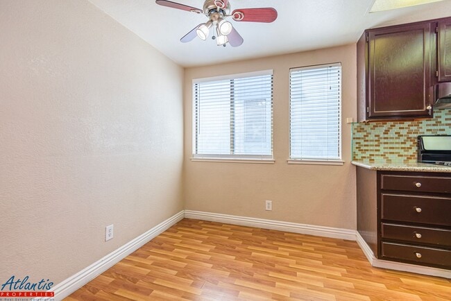 Building Photo - Lovely Condo | Garage | A/C | In-Unit Laundry