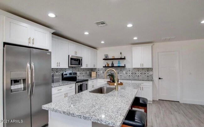 Building Photo - 5735 S 12th Ln