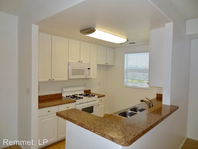 Building Photo - 10201 Remmet Ave