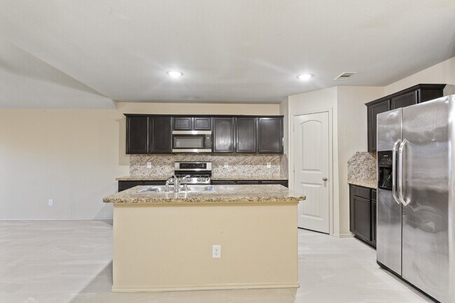 Building Photo - COMING SOON 6/1/2026 2414 Fall Aster - Beautiful 4-bedroom, 2-bathroom home with a 2-car garage l...