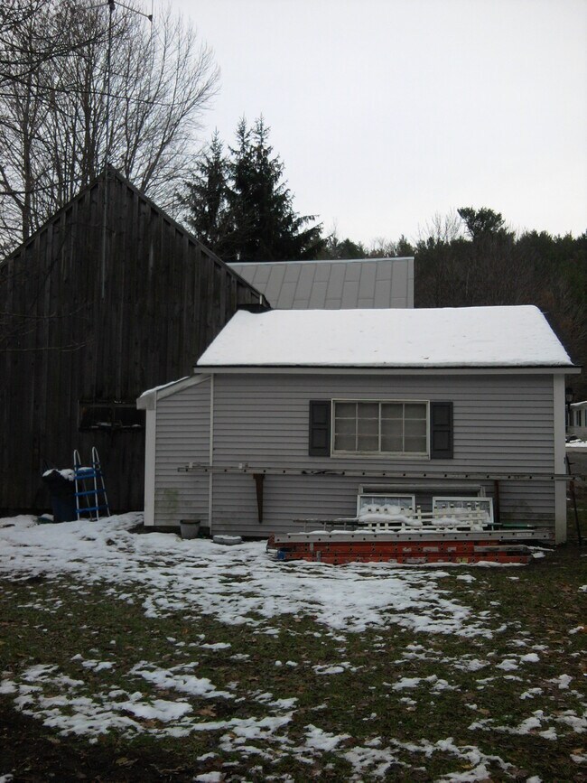 behind garage - 2335 Main St