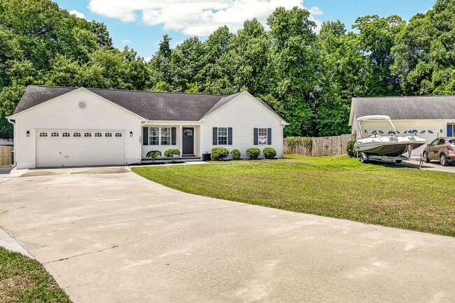 Building Photo - Charming Cow Horn Village Home with Outdoor Shower & Fenced Backyard
