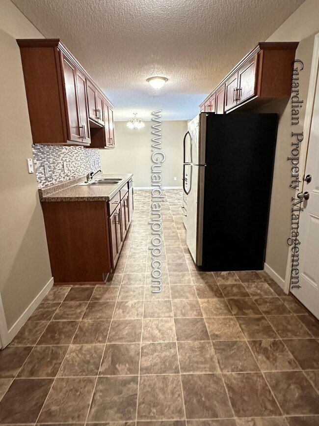 Building Photo - North Brooklyn Park Town Homes, Dedicated ...