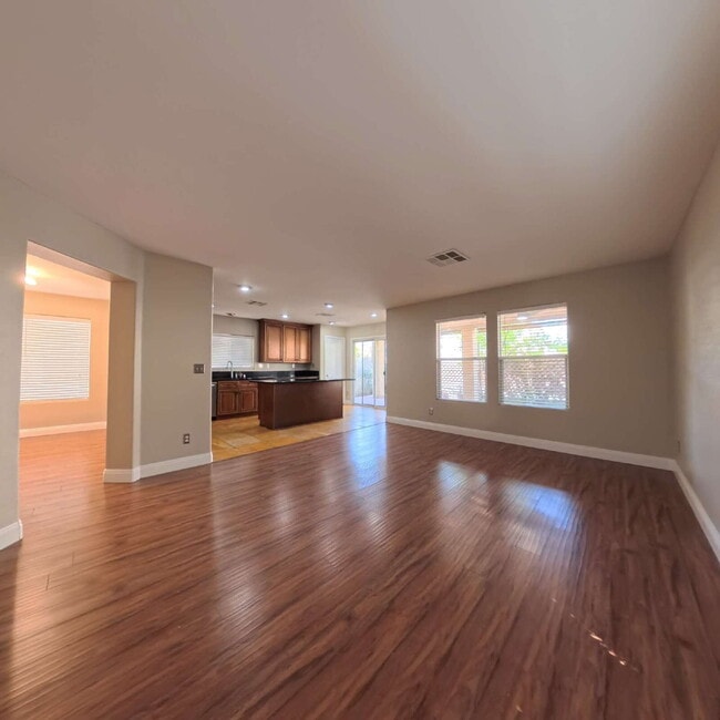 Building Photo - Stunning 2-Story Home with a Bedroom downstairs and a Backyard Oasis.