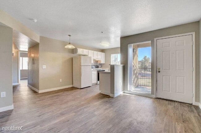 Building Photo - 1650 N Pecos Rd