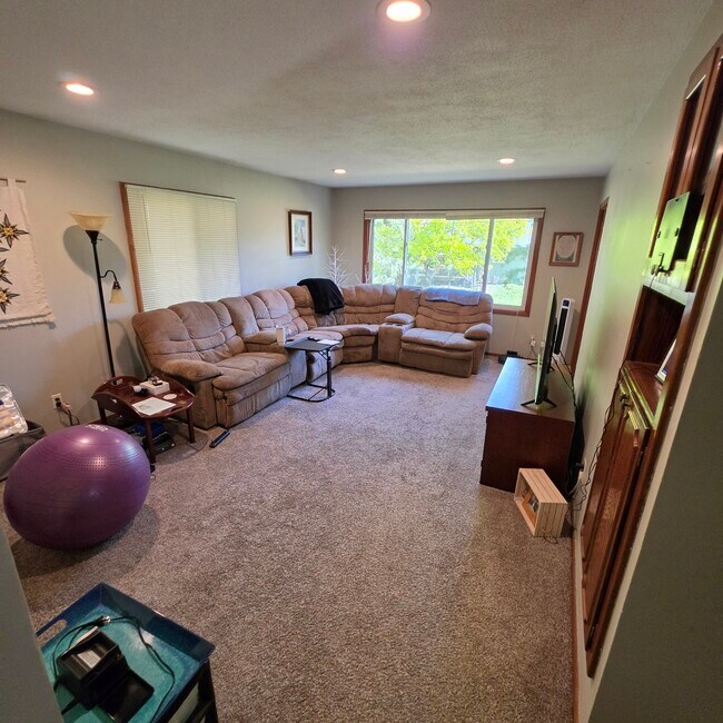 Formal dining area being used as a upper level living room - 2248 139th Ave NW