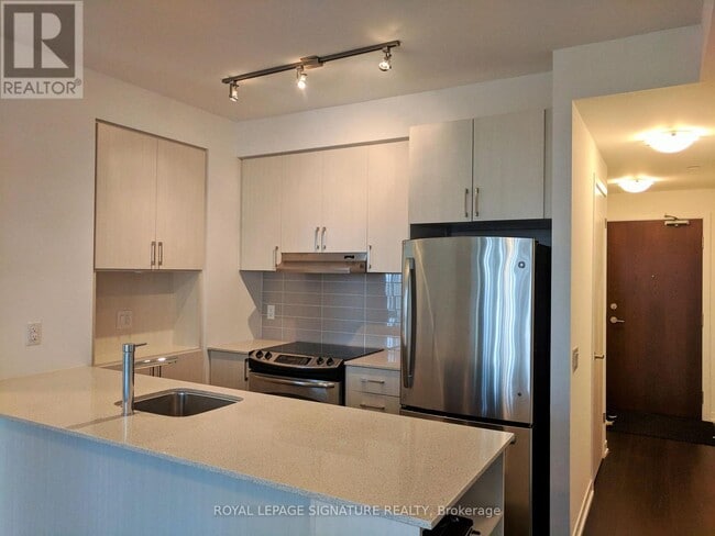 Building Photo - 2560-2560 Eglinton Ave W