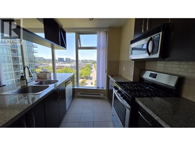 Building Photo - 5068 Kwantlen St