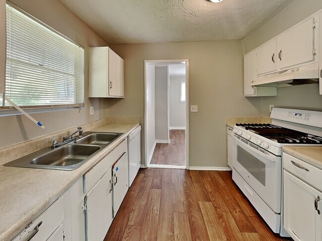Building Photo - One Month Free!  Charming 3 Bedroom locate...