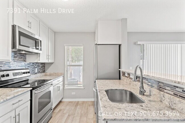 Building Photo - 7391 Palm Hills Dr