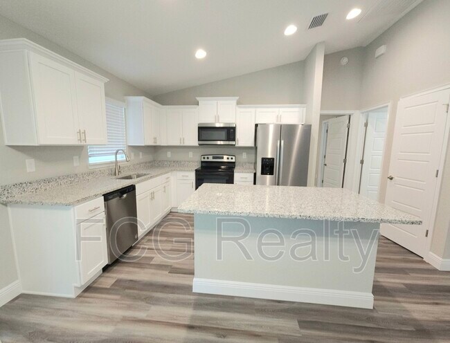 Building Photo - 10057 N Athenia Dr