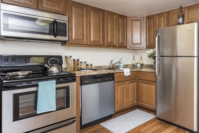 Newly Renovated Kitchen - Regency Club Townhomes & Apartments