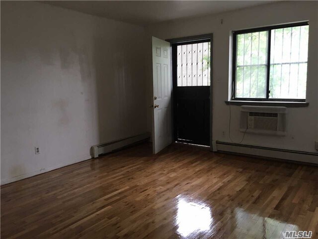 Building Photo - 108-11-108-44 44th Ave