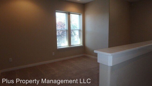 Building Photo - 1675 NE Lotus Dr
