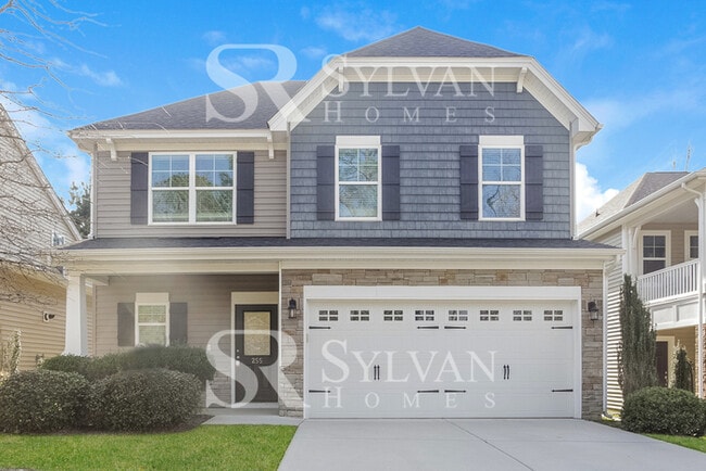 Building Photo - The living is easy in this lovely 5 bedroo...