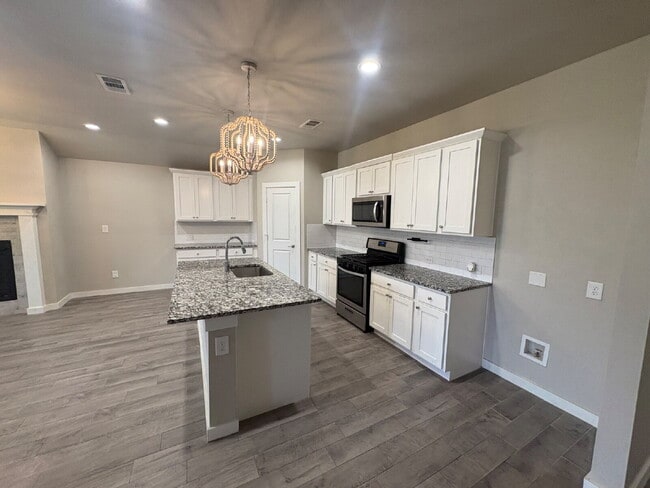 Building Photo - Beautiful 4 Bedroom 2 Bath Home in Wollforth!