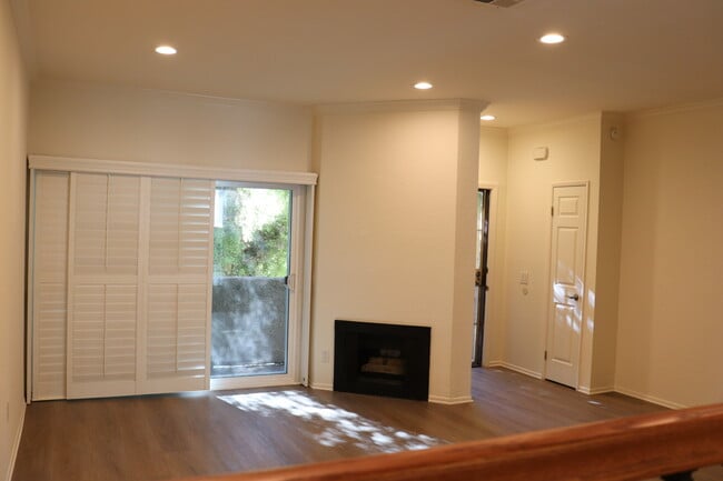 Living room is opening up to the balcony - 18342 Malden St