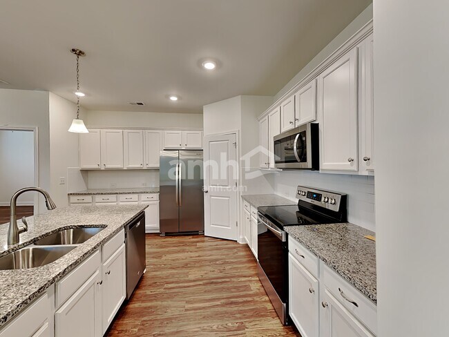 Building Photo - 7077 Creeksong Dr