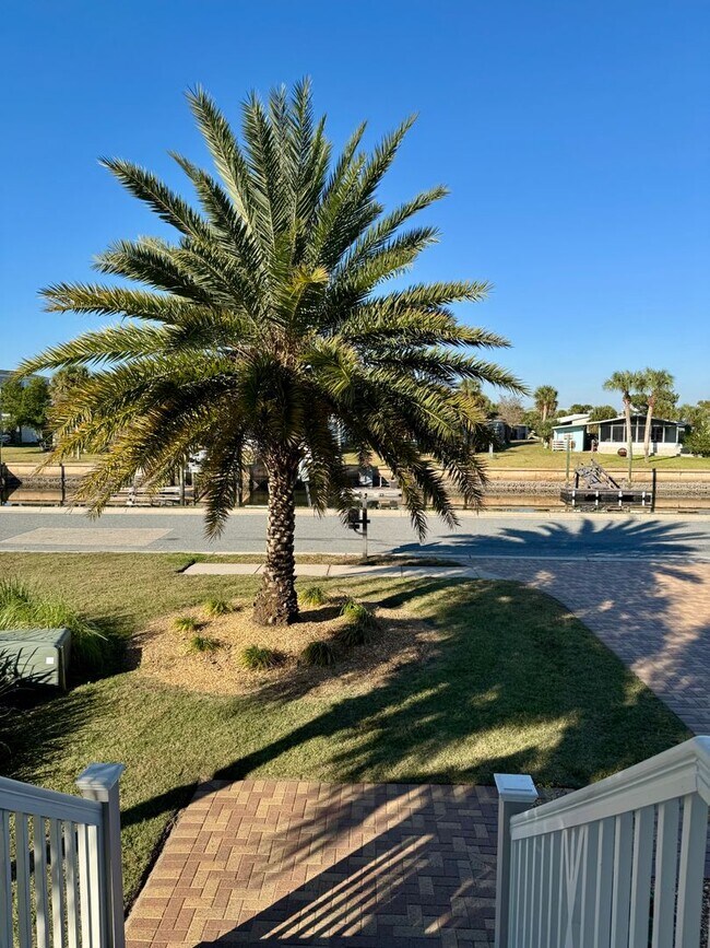 Building Photo - Waterfront Shell Point Home with Dock, Hot Tub, Elevator, & Golf Cart