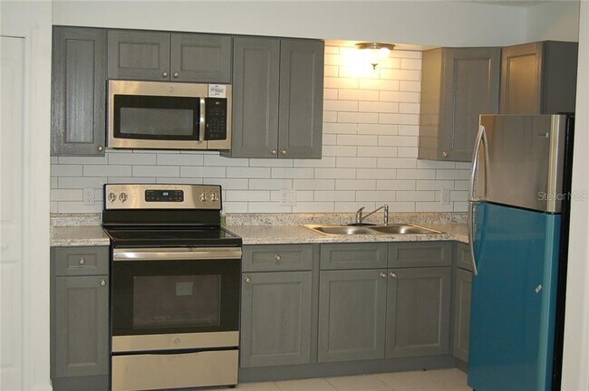 SOLID WOOD CABINETS - 397 S Orange Ave
