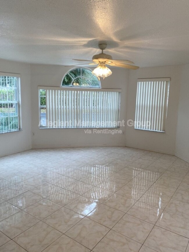 Building Photo - 8722 Rain Forest Pl