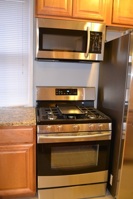 Stainless Steel Stove and Microwave - 6148 Winthrop Ave