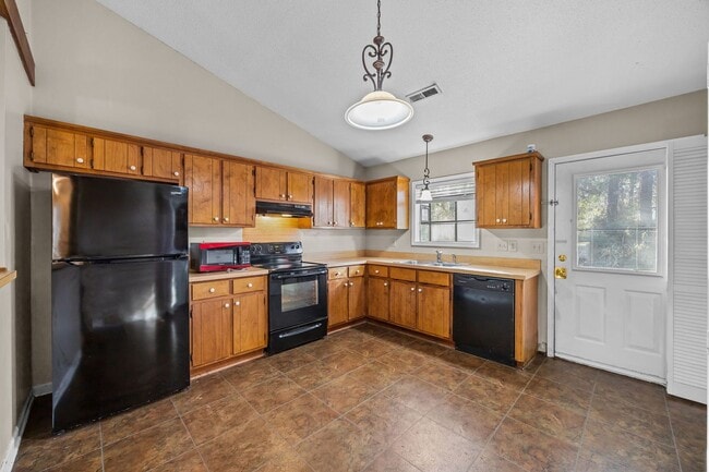 Building Photo - Welcome to Village Cedars!