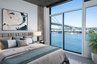 Beautifully designed interiors with high ceilings, oversized windows, and custom roller shades - The Sutton