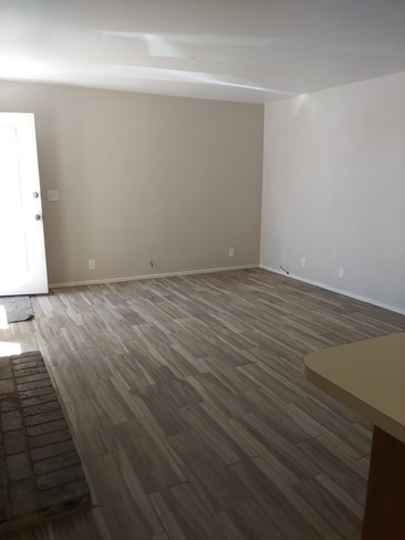 Front living area, newly tiled - 437 S Sunset St