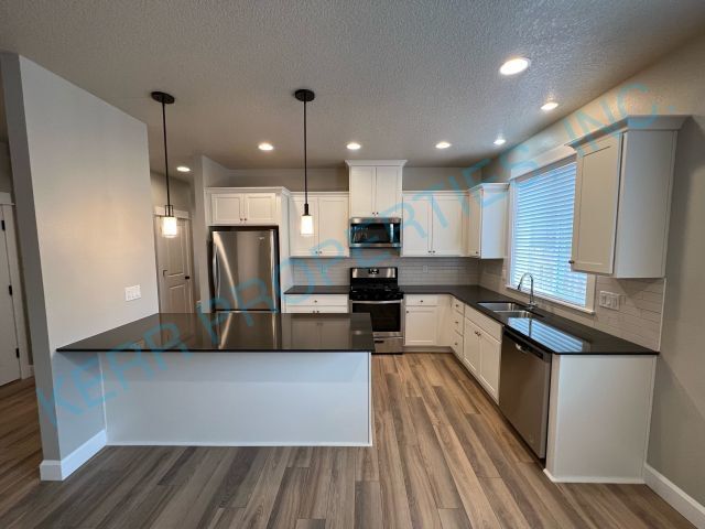 Foto del edificio - Charming 4-Bedroom Home with 2 Full Baths ...