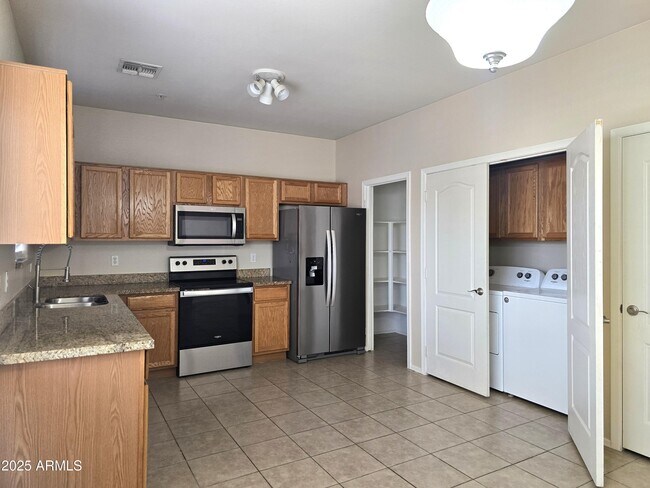 Building Photo - 8940 W Olive Ave