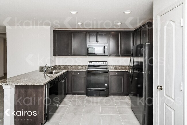 Foto del edificio - 8419 Indian Laurel Ln