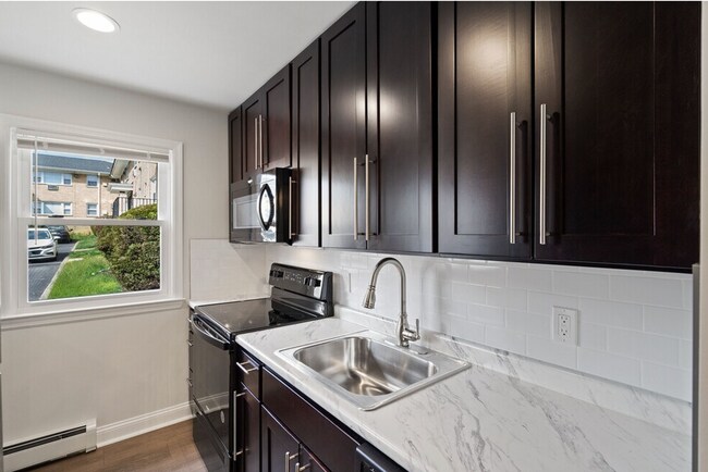 Building Photo - Village Arms Apartments