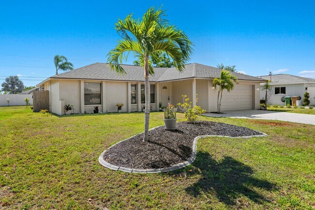 Building Photo - Available Now!  3/2 Pool Home in Southeast Cape