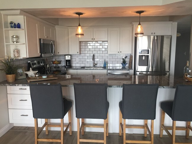 Kitchen bar area - 324 E Beach Dr