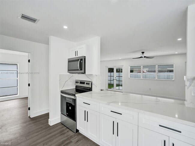 Foto del edificio - 4 br, 2 bath House - 11550 SW 80th Ter # 0
