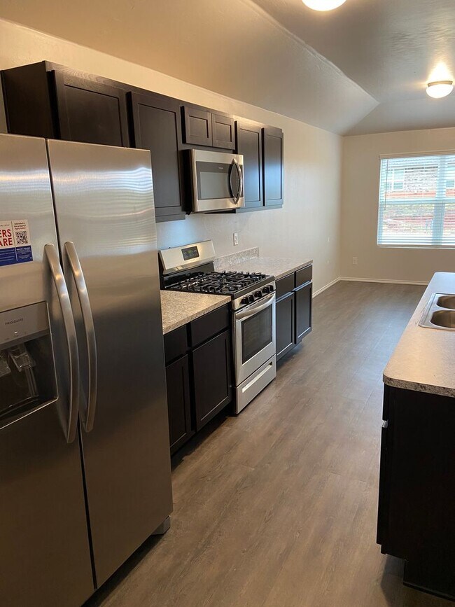 Building Photo - *Tax Relief Special!* Four Bedroom | Two B...
