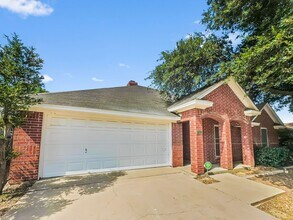 Building Photo - 7912 Buttercup Cir N