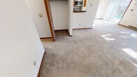 This 760 square foot apartment in Madison, Wisconsin offers a practical and comfortable living space. The single-story layout comprises two bedrooms, one bathroom, and a kitchen, efficiently arranged within its compact footprint. The primary bedroom, measuring 150 square feet, provides ample space for a restful retreat.

Throughout the apartment, wall-to-wall carpeting adds warmth and comfort underfoot. Large windows in the bedrooms and living area allow natural light to flood the space, creating a bright and airy atmosphere. The bathroom features a combination tub and shower, a single vanity with a granite countertop, and tiled flooring for easy maintenance.

The kitchen, while compact, is well-equipped with wooden cabinetry, granite countertops, and modern appliances, including a refrigerator. Adjacent to the kitchen, a dedicated laundry area with a washer and dryer adds convenience to daily living.

The open-plan living and dining area offers flexibility in furniture arrangement and serves as the heart of the home. Wood trim around doors and baseboards adds a touch of classic detail to the otherwise modern interior.

Located at 7626 Radcliffe Drive Apt B in Madison, this apartment combines functionality with comfort, making it an ideal choice for those seeking an efficient living space in a desirable location.