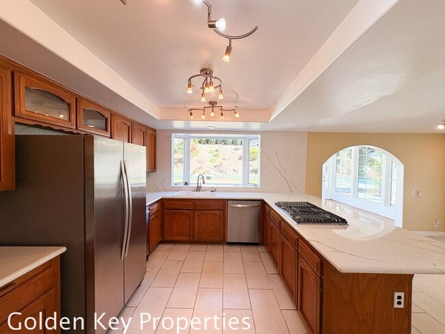 Building Photo - Welcome to this stunning 4-bedroom, 3-bathroom home located in the desirable La Costa neighborhoo...