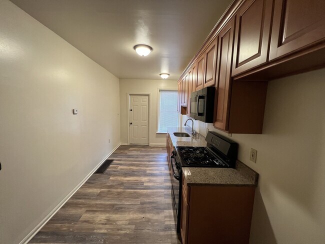 Building Photo - AVAILABLE JUNE! Newly Renovated property j...