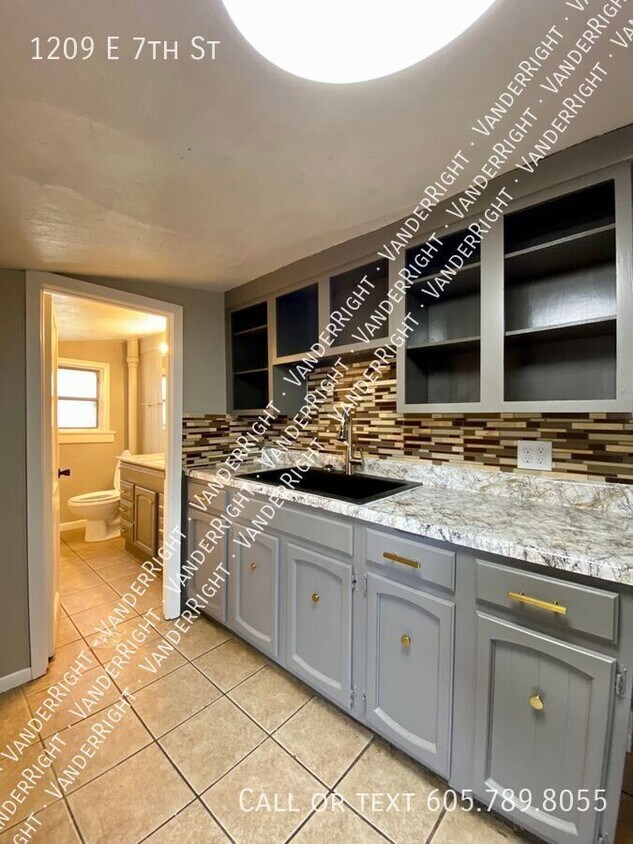 Primary Photo - Updated 3 Bedroom House With Fenced Yard!