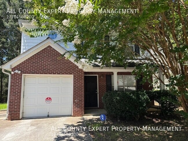Foto del edificio - 7066 Ravenwood Ln